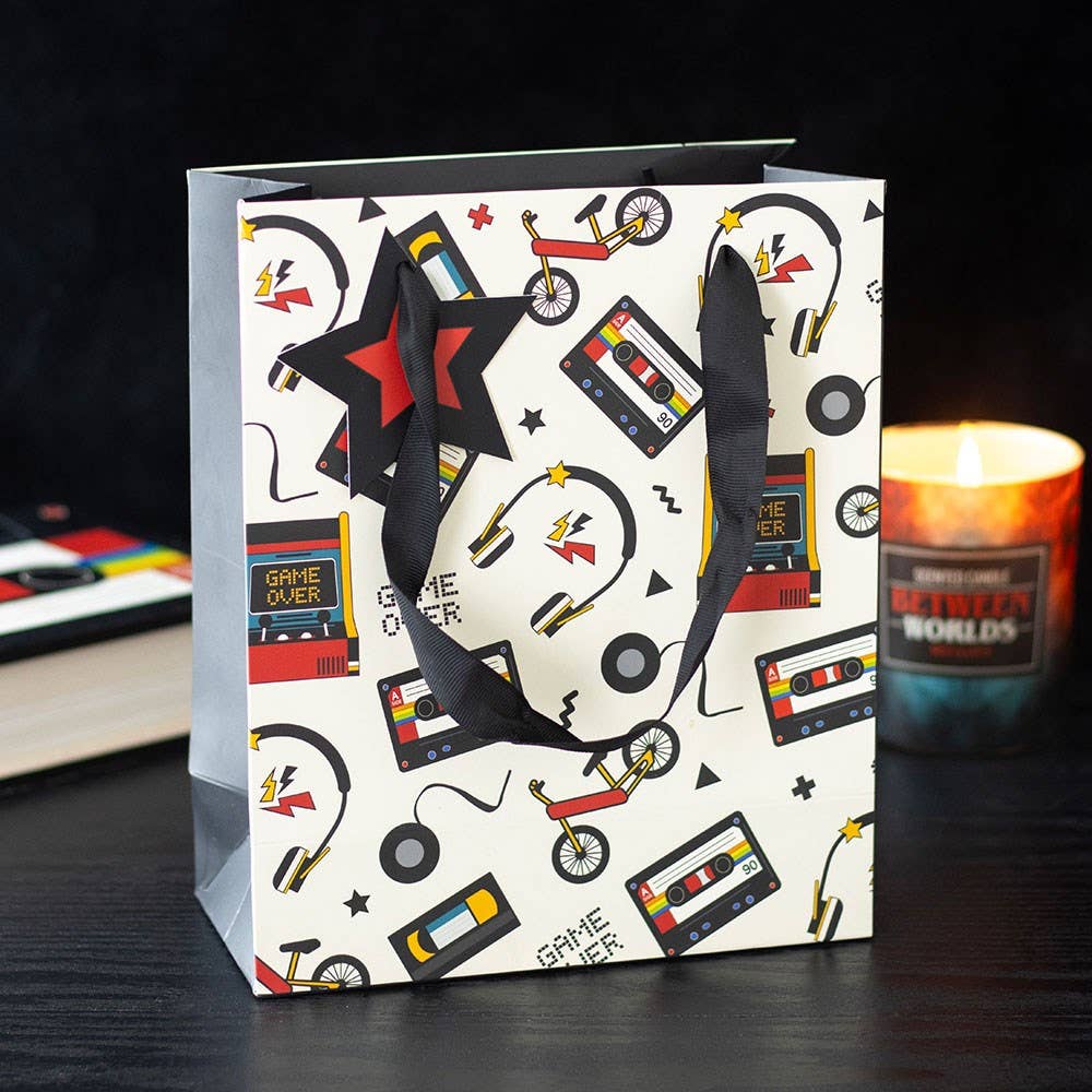Gift bag front view styled with candle and décor