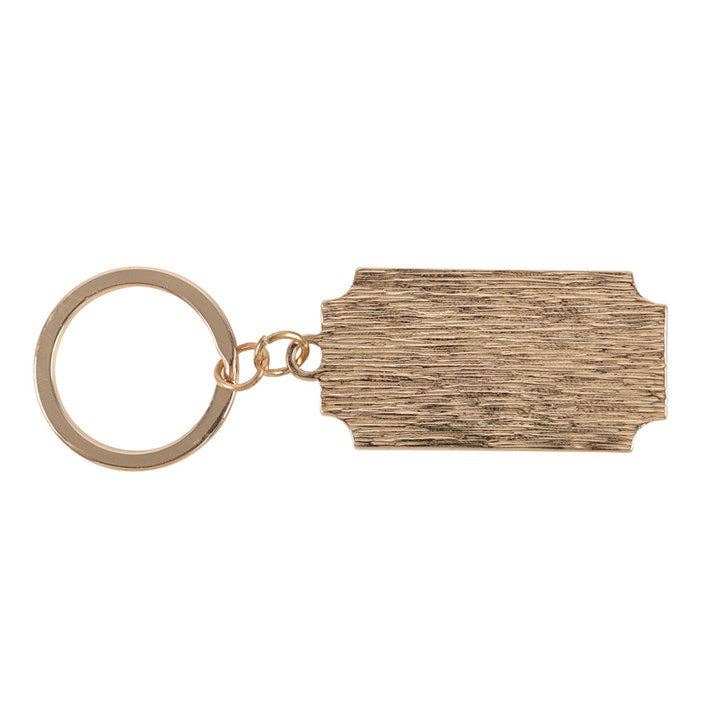 Back of keyring showing textured metal backing