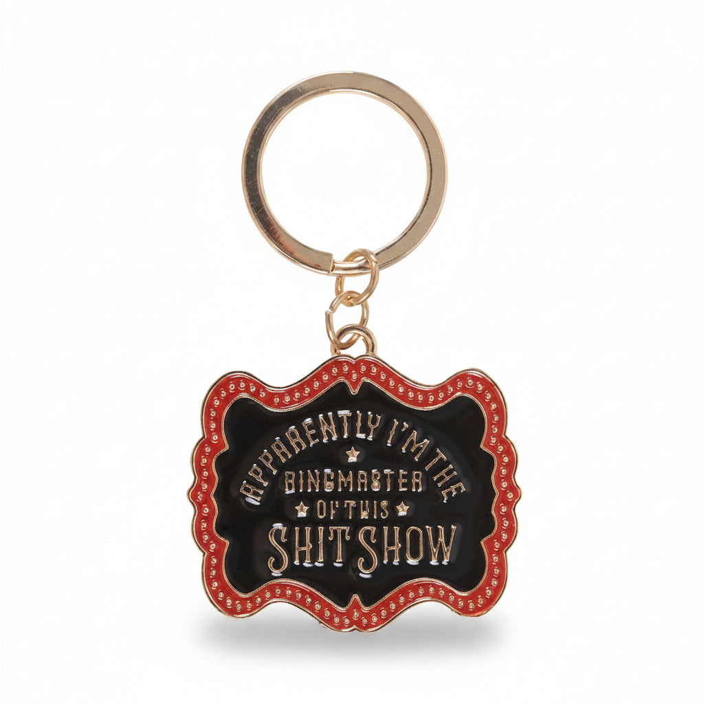 Keyring detail showing vintage circus design on white background