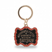 Keyring detail showing vintage circus design on white background