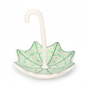 Top-down view showing floral pattern inside dish on white background