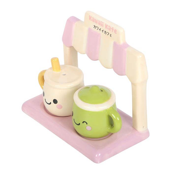 Front view of both shakers in pink stand on white background