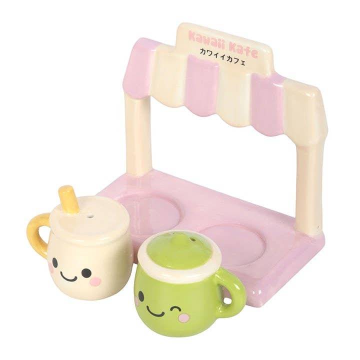 Angled view showing cute faces on ceramic shakers