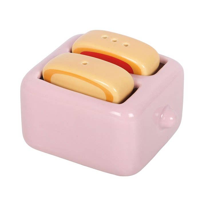 Front view of both toast character shakers in pink stand