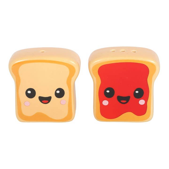 Angled view showing cute faces on ceramic toast shakers
