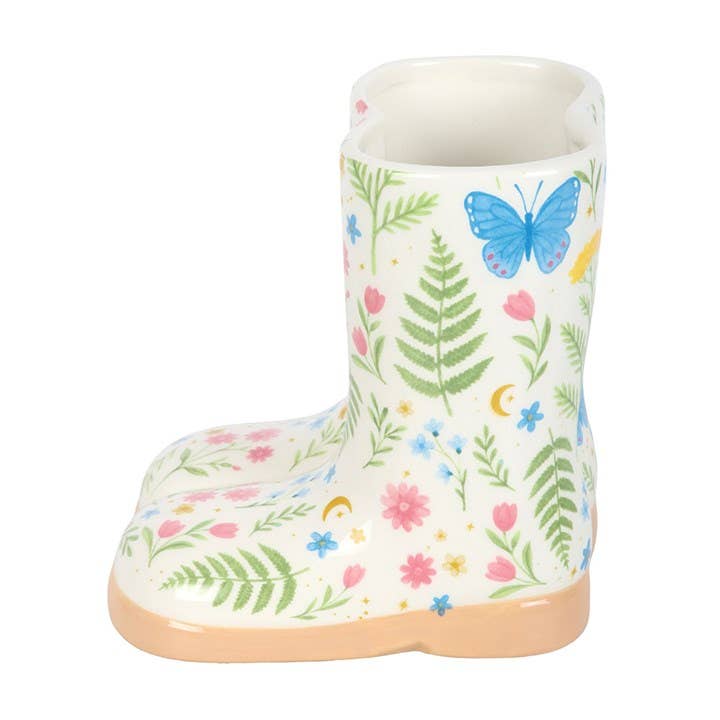 Angled view of ceramic welly boot on white background