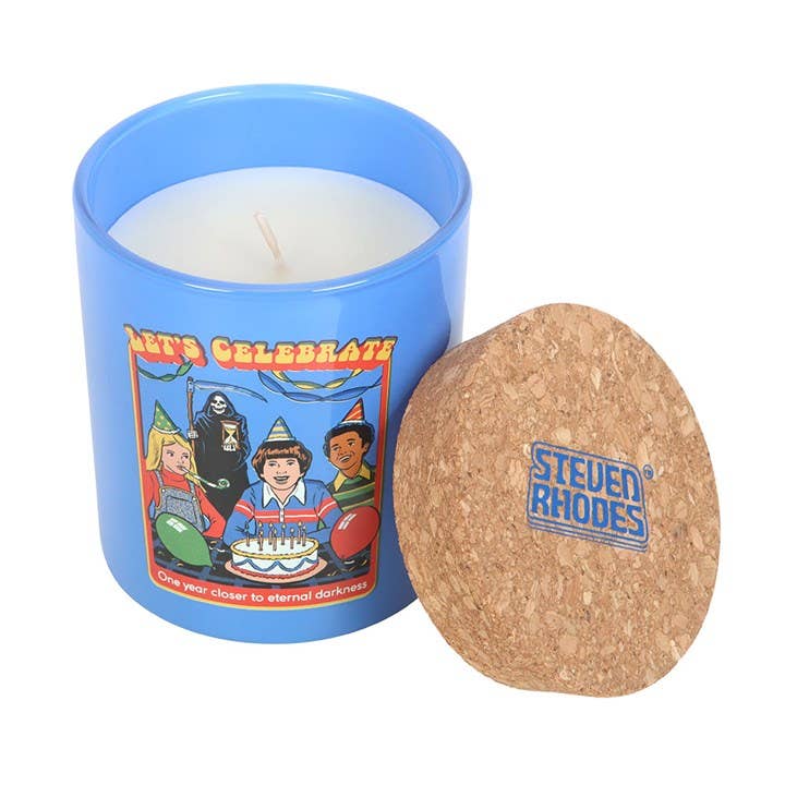 Blue jar with lid removed showing candle wax