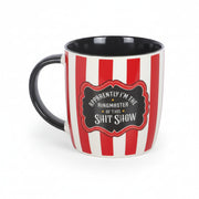 Close-up of ceramic mug showing ringmaster quote on white background