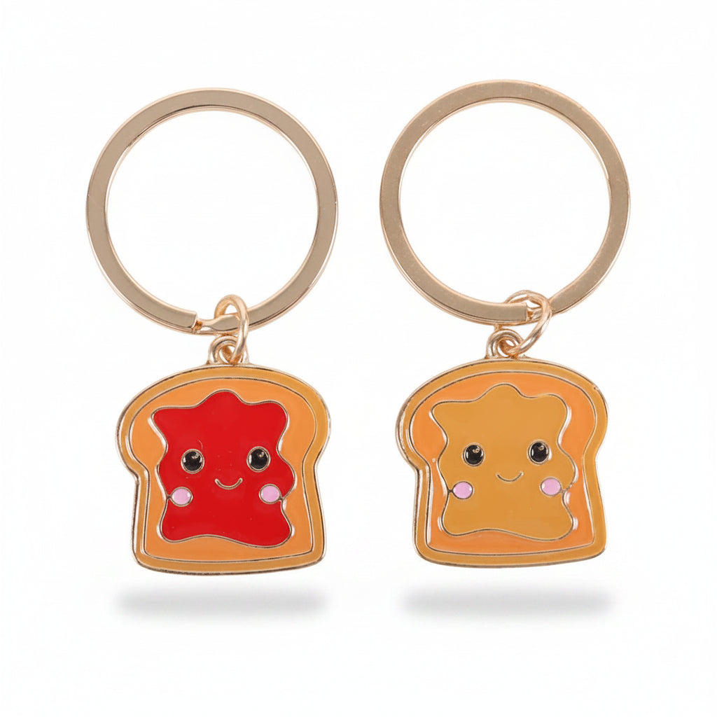 Close-up of the two keyrings on white background