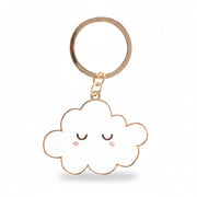 White enamel cloud charm close-up with gold outline and sleepy face