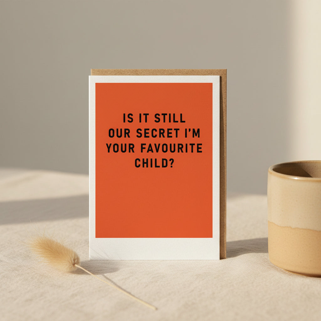 Framed print with orange background and black text on a white background