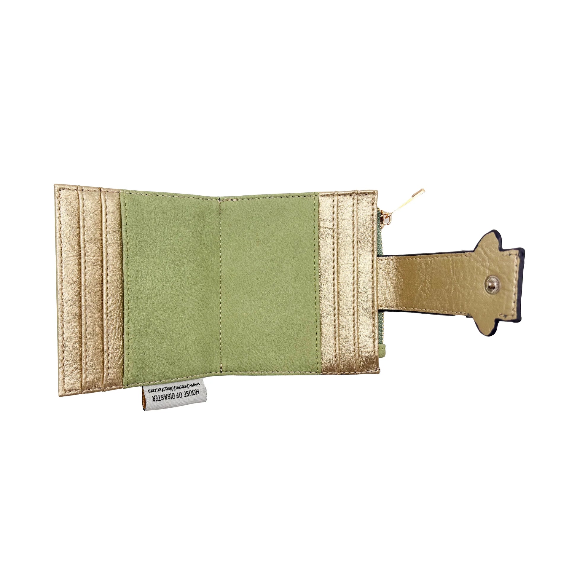Interior view of moth foldover purse showing green lining and gold card slots on white background