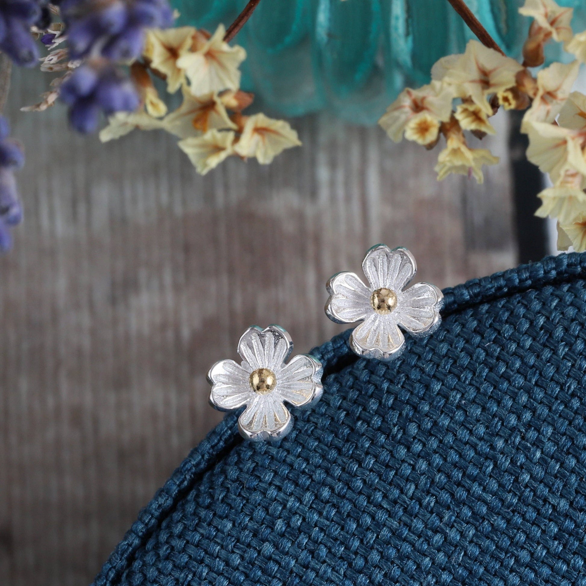 Silver four-petal blossom earrings with sentiment card