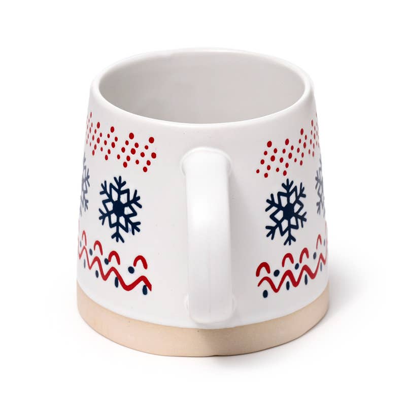 Snowflake Stoneware Mug back view showing handle and wraparound blue snowflake pattern.
