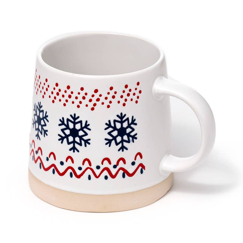 Side angle of Snowflake Stoneware Mug with festive design and cream ceramic base.