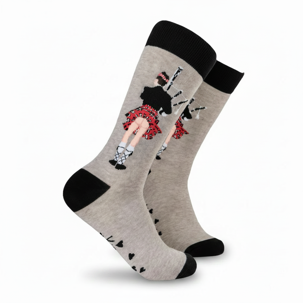 Grey kilted piper socks with black cuff and toe on a white background
