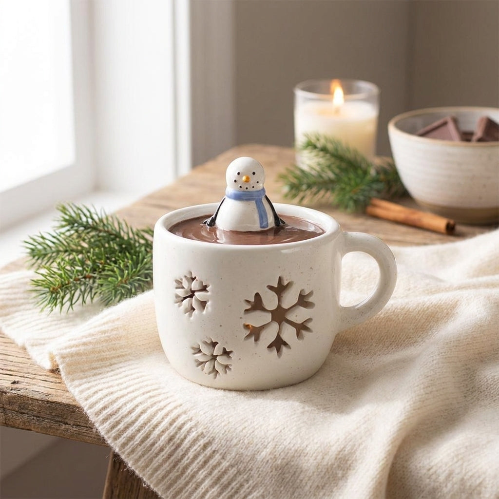 Snowman wax warmer styled on a cosy winter table