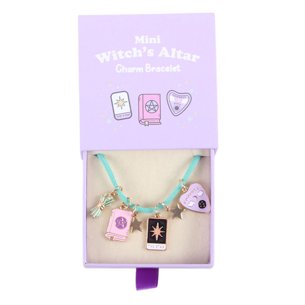 Witch's altar bracelet inside its open lilac gift box