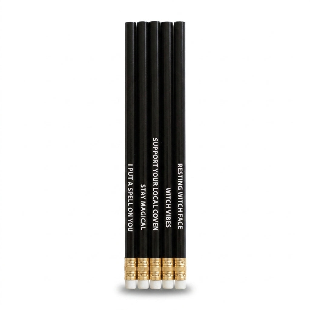 Set of five black witchy pencils on a white background