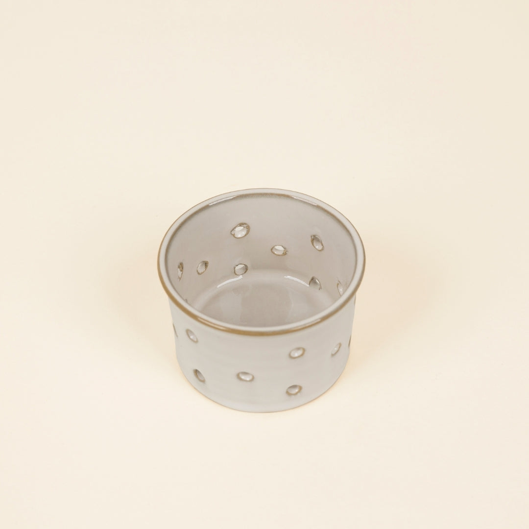 Glazed Ceramic Tealight Holder lifestyle base image on a cream background