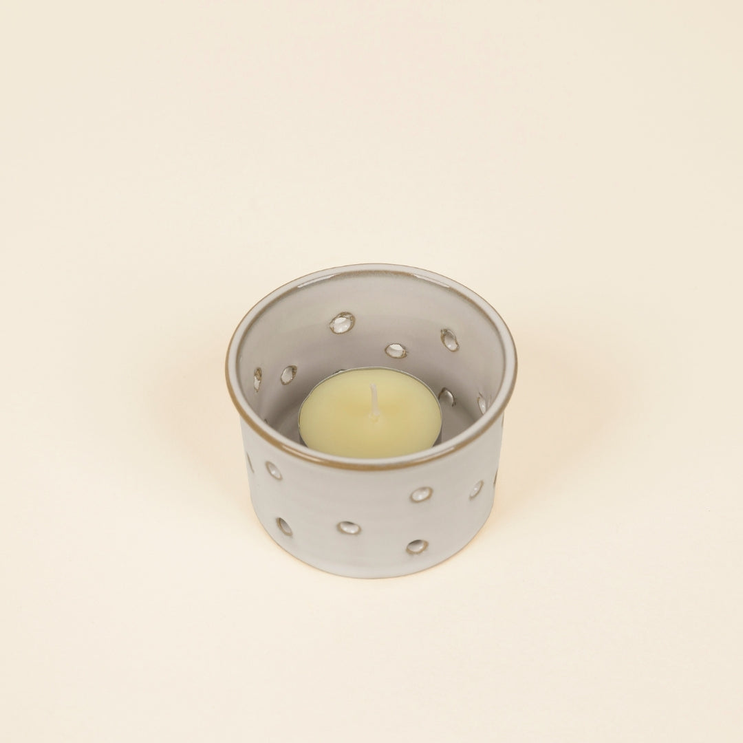 Glazed Ceramic Tealight Holder holding a tealight, seen from above