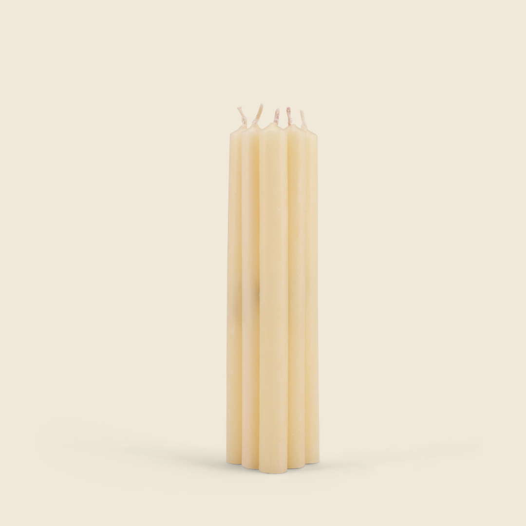 Inspiritus Mini Festive Candles, Pack of 6 bundle of six ivory candles on a cream background