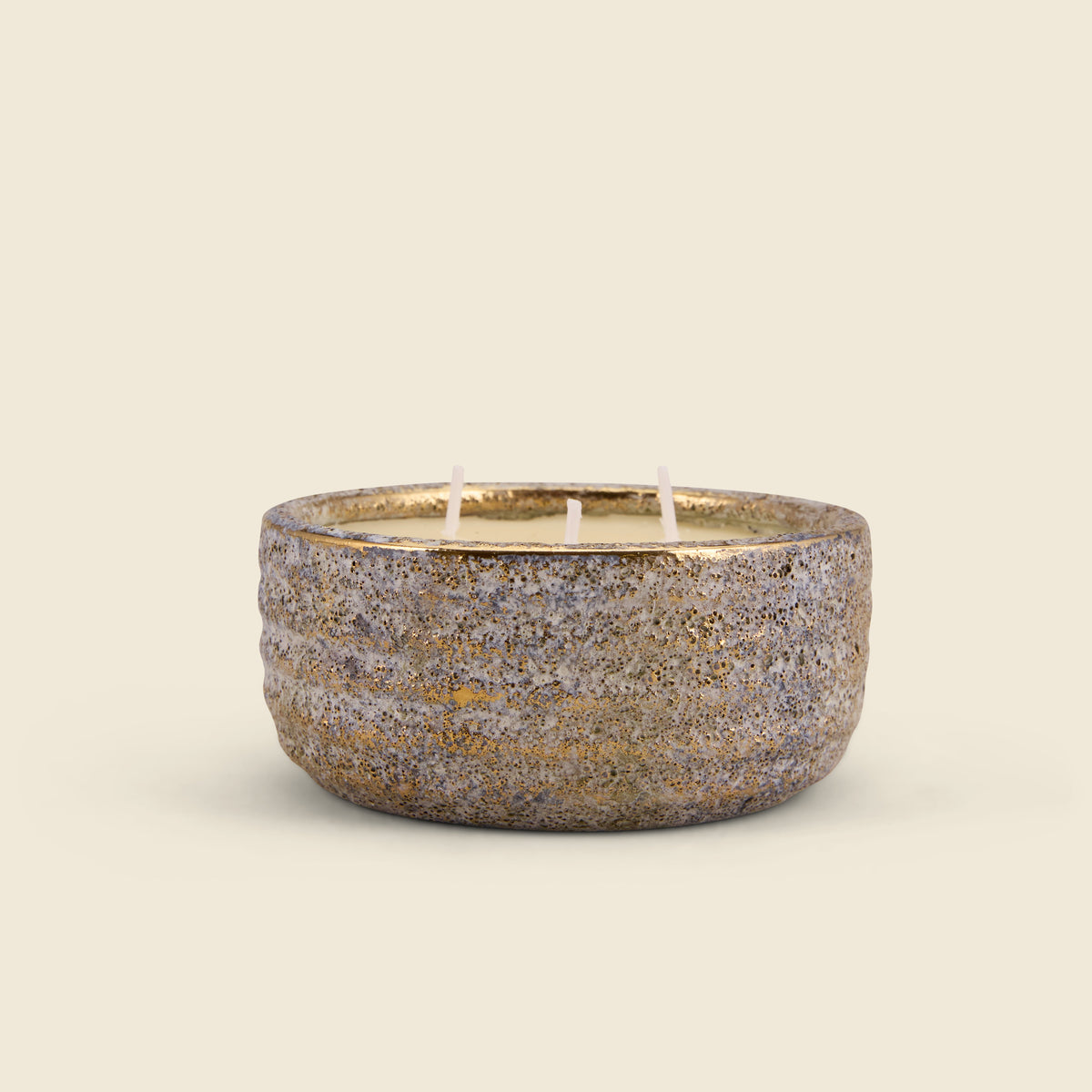 Inspiritus Small Alchemy Pot Candle side view showing the gold-flecked stone finish