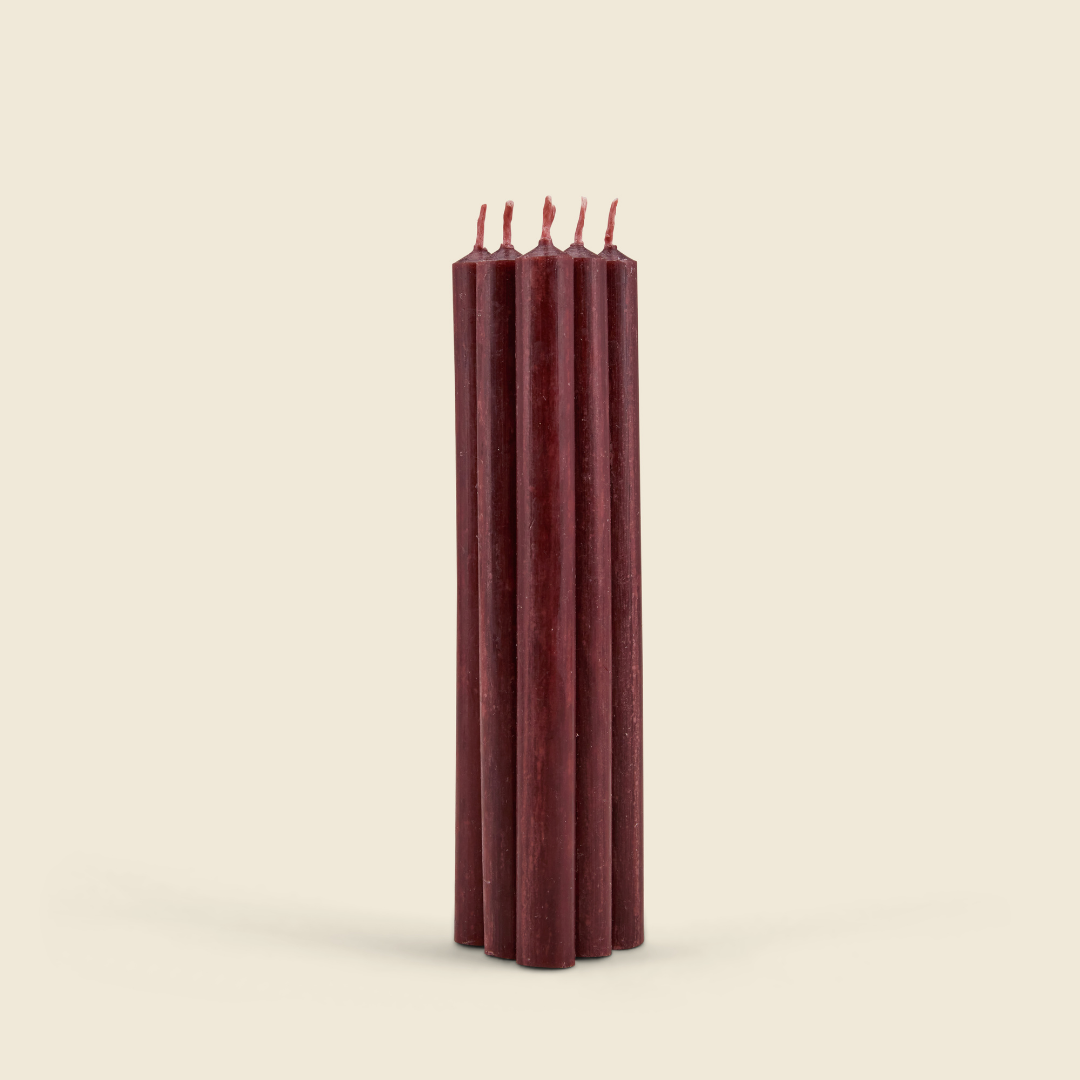 Sacred Forest Mini Festive Candles, Pack of 6 bundle of six deep red candles on a cream background