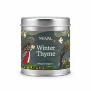 Winter Thyme Christmas Tin Candle with illustrated label on a cream background