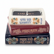 Jane Austen bookstack candle shaped like three stacked ceramic books, white background