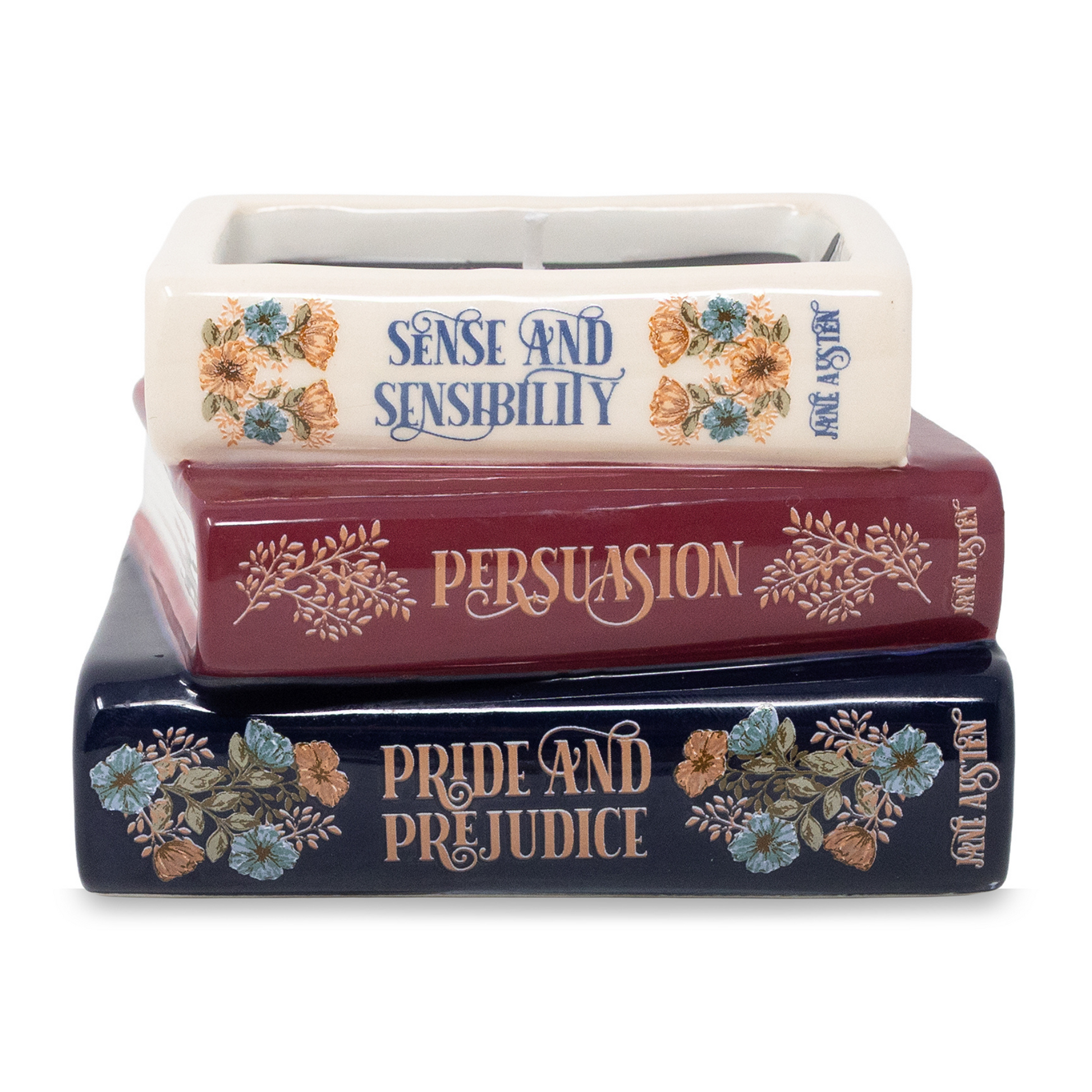 Bookstack candle showing Pride and Prejudice, Persuasion and Sense and Sensibility spines