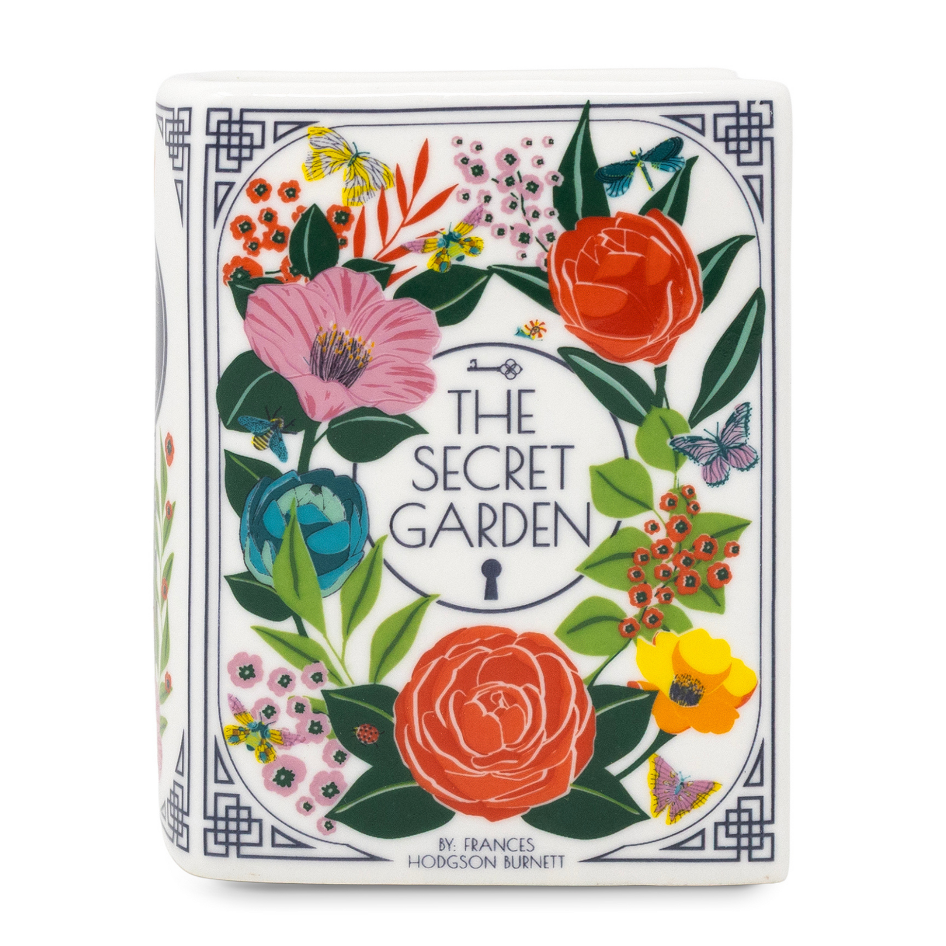 The Secret Garden book candle with floral cover, white background