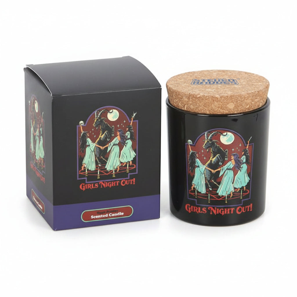 Steven Rhodes candle with cork lid next to black gift box