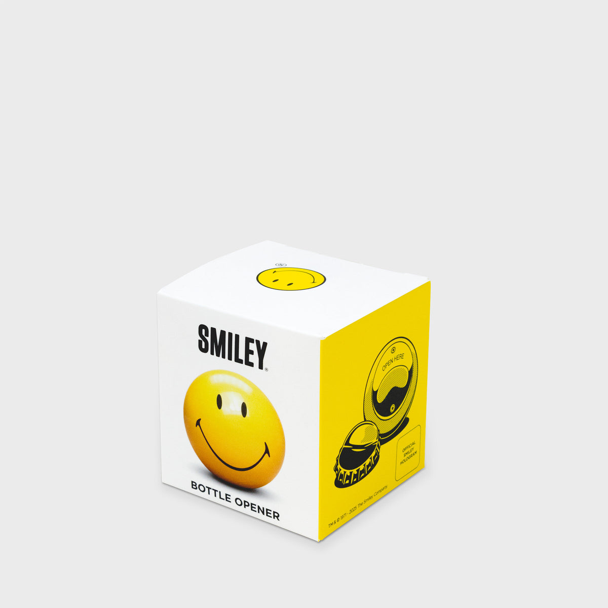 Smiley pool ball bottle opener in its white and yellow gift box
