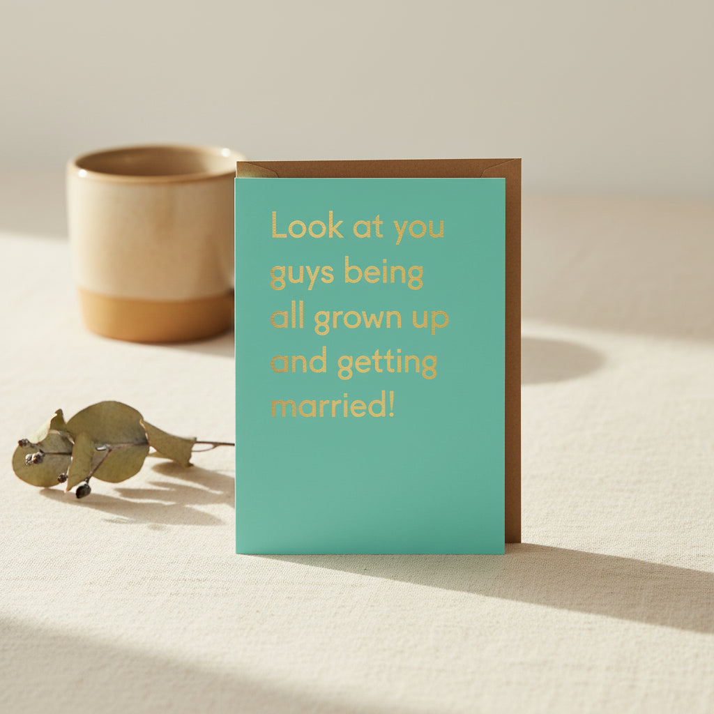 Greeting card with yellow text on a teal background