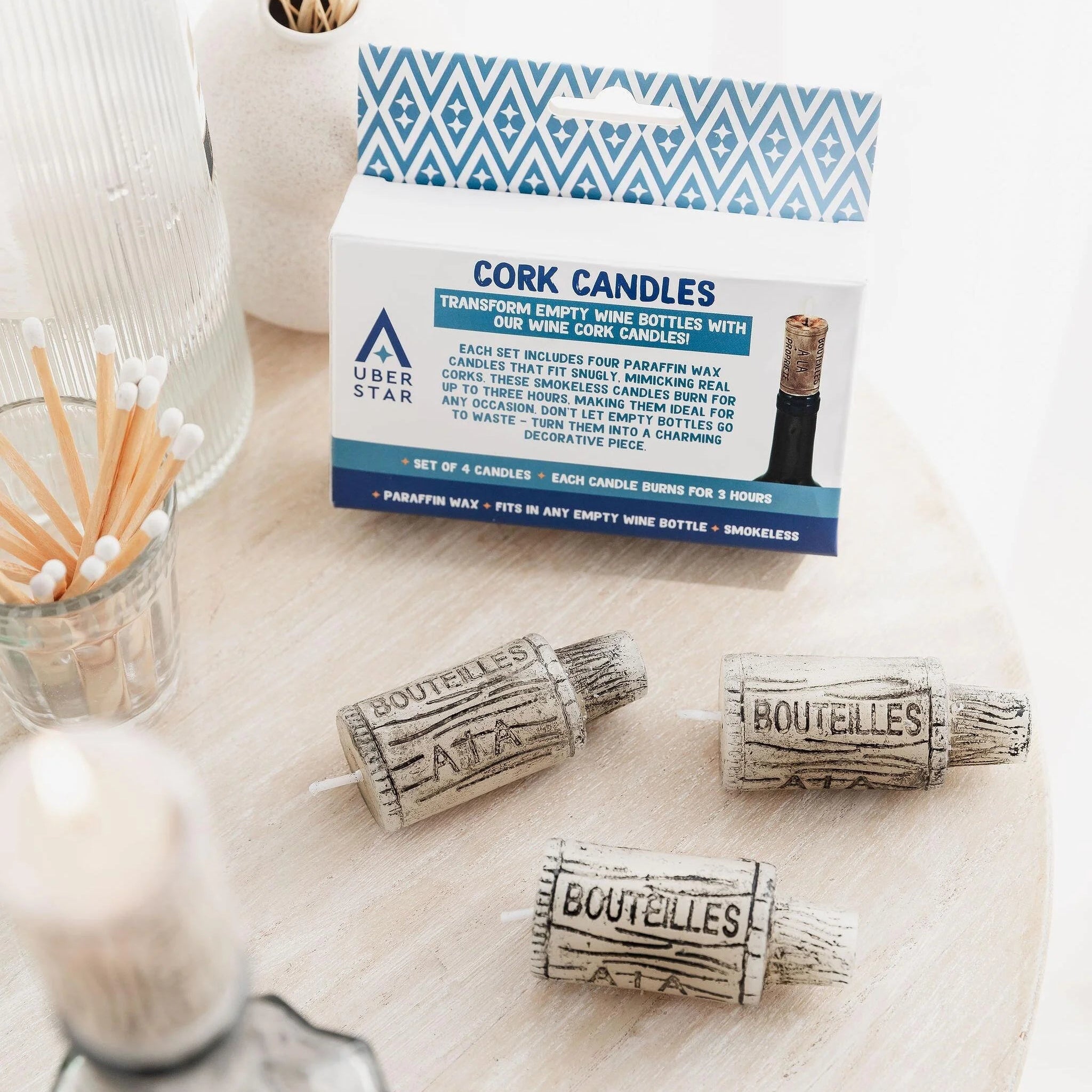 Box of Uberstar Wine Cork Candles with rustic candle design.