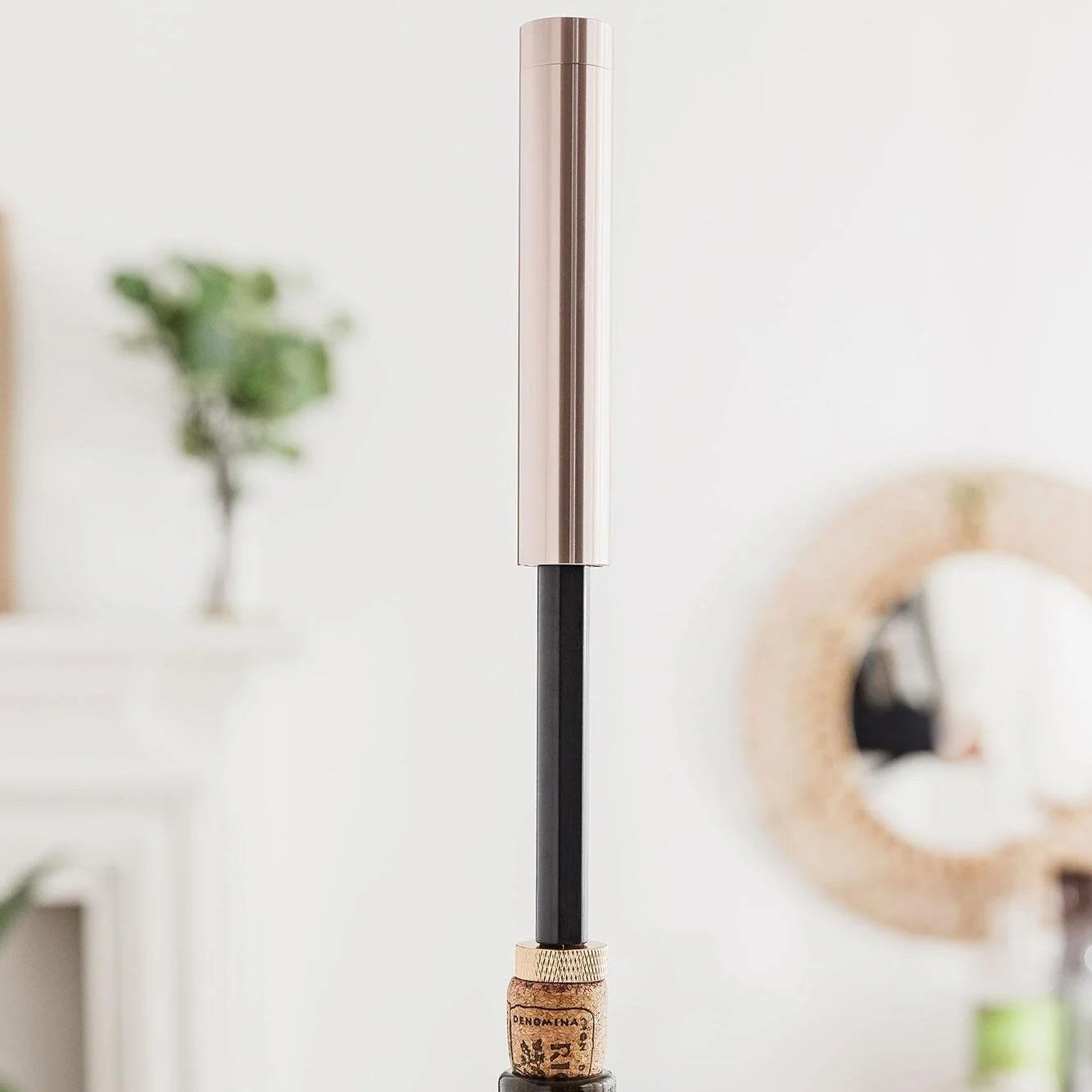 Using air pump wine opener to remove cork - image 2