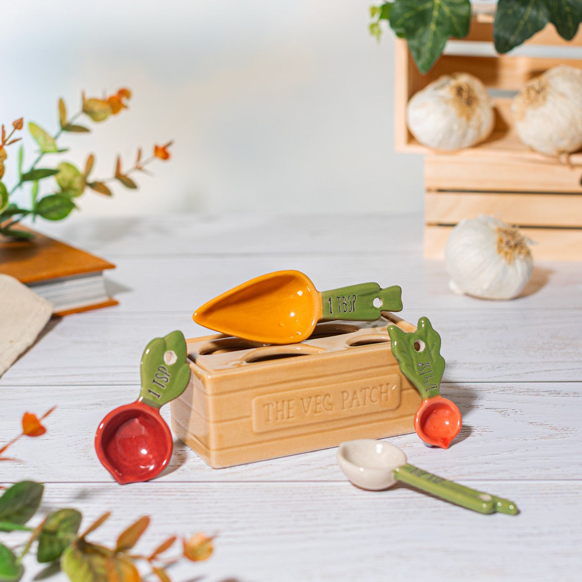 Sass and Belle vegetable measuring spoons in their veg patch holder in a kitchen setting