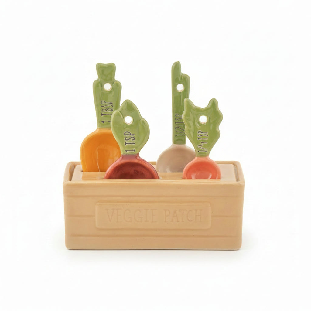 Sass and Belle vegetable-shaped ceramic measuring spoons in veg patch holder on white background