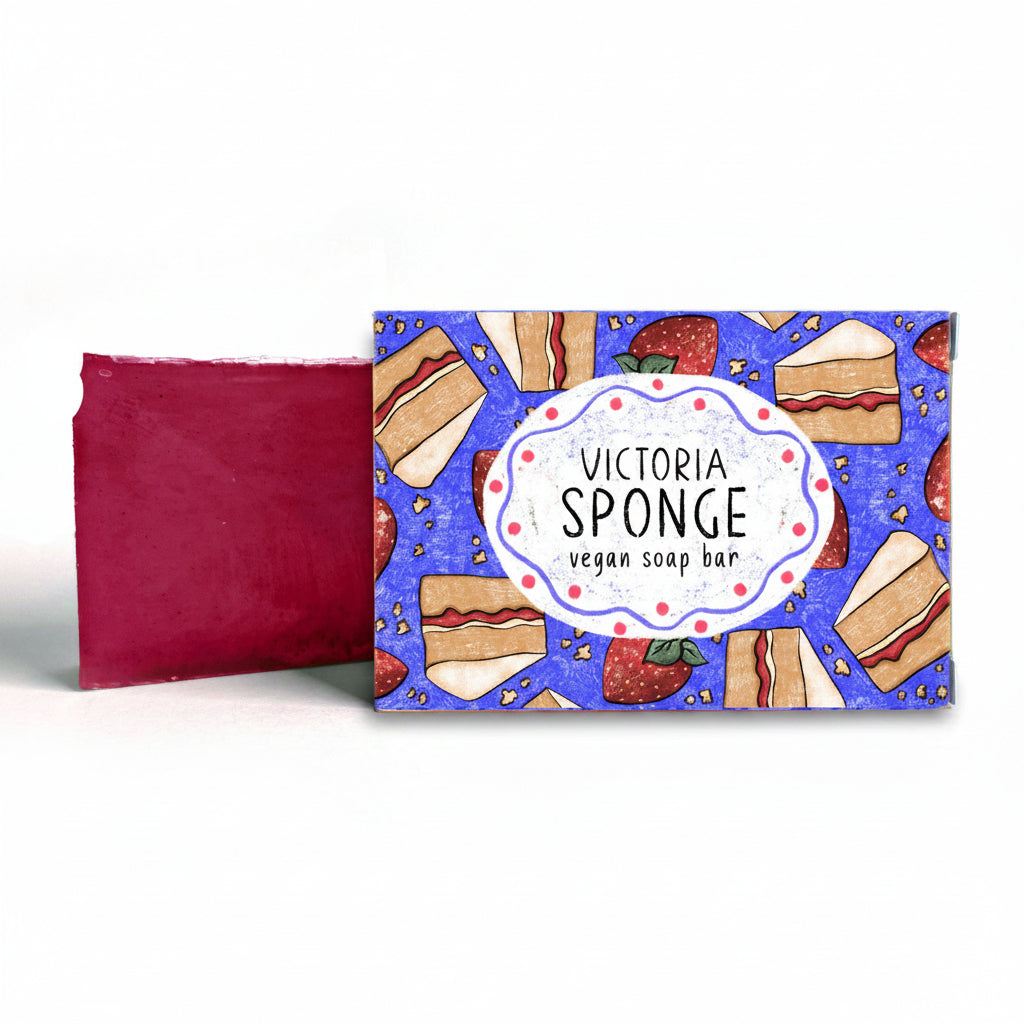 Victoria sponge cake-shaped soap with packaging display.