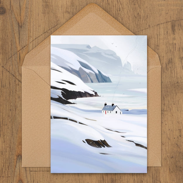 Winter at Kearvaig Bothy greeting card featuring Sara Willia's snowy Scottish bothy artwork with kraft envelope