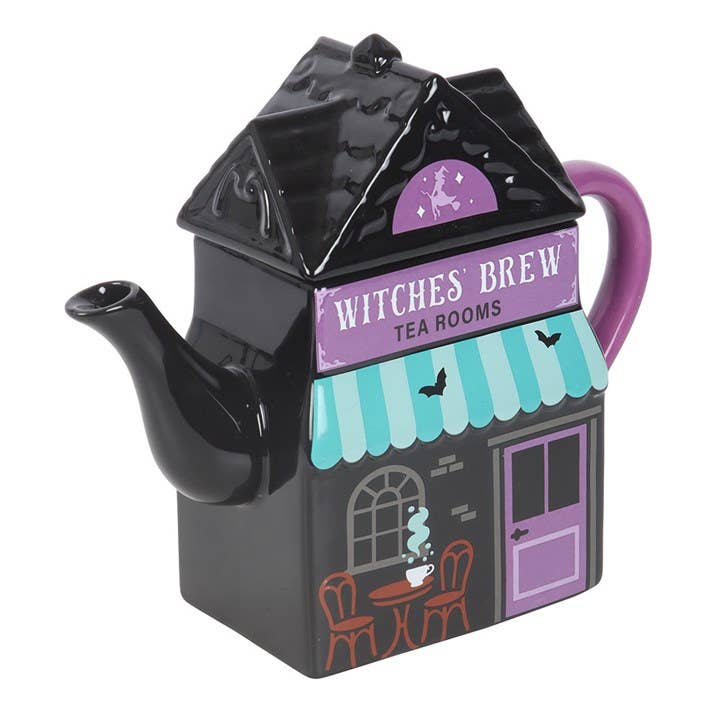 Witches' Brew Halloween teapot in a styled setting