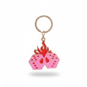 Y2K style flaming dice keyring on a roll of the dice card