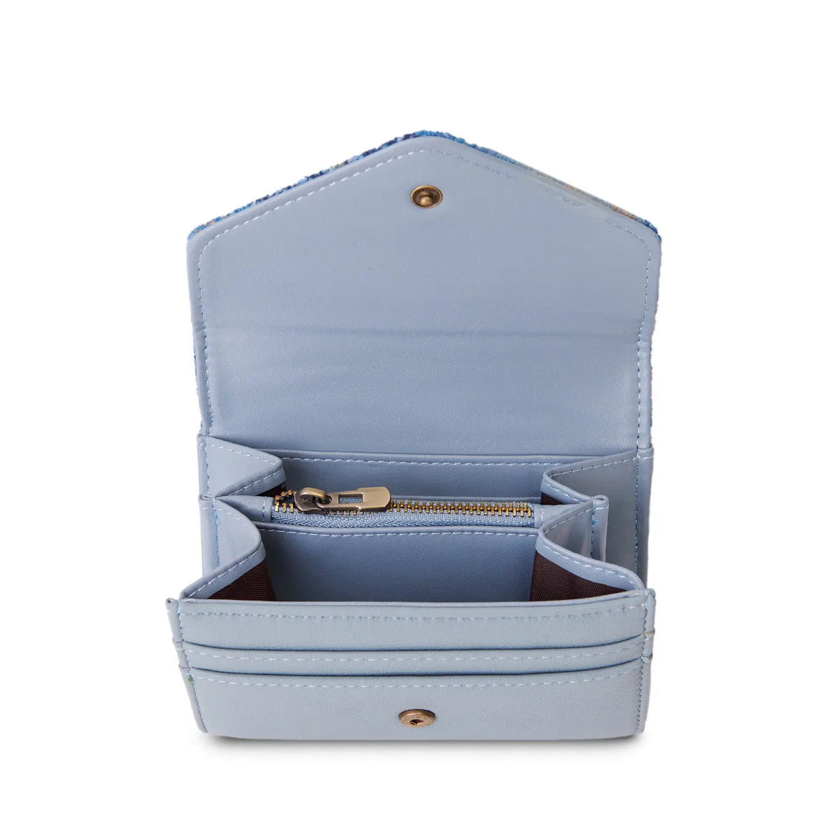 Inside the purse showing the internal compartments and zipped section. It has two card slots on the front and you can see the button popper. 